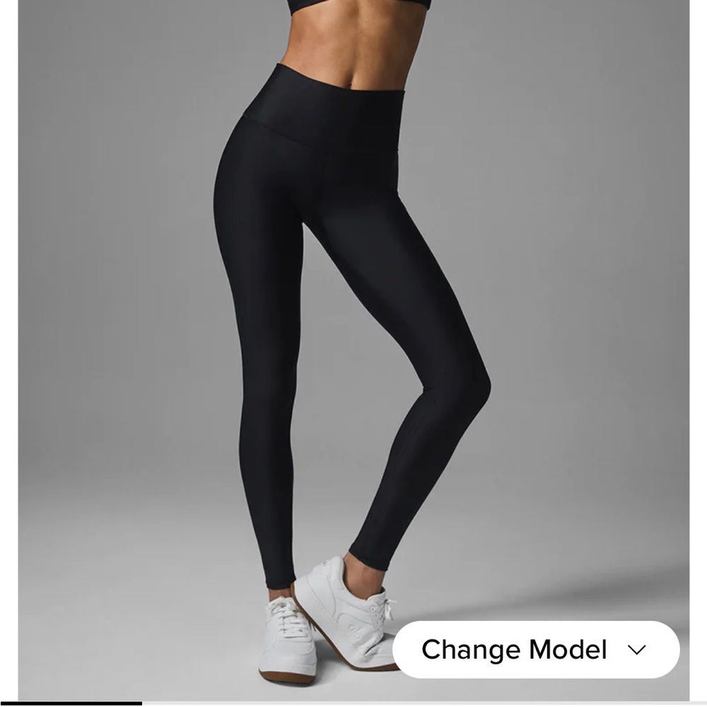 Ali Yoga 7/8 high-waist Airlift leggings in black.